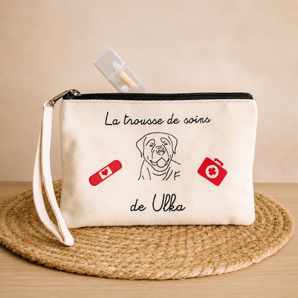 Trousse « La trousse de soins de Ulka » avec dessin de chien et pictos soins en flex noir et rouge