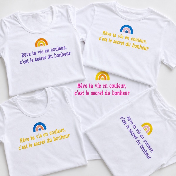 T-shirts blancs « Rêve ta vie en couleur, c’est le secret du bonheur » avec arc-en-ciel en flex